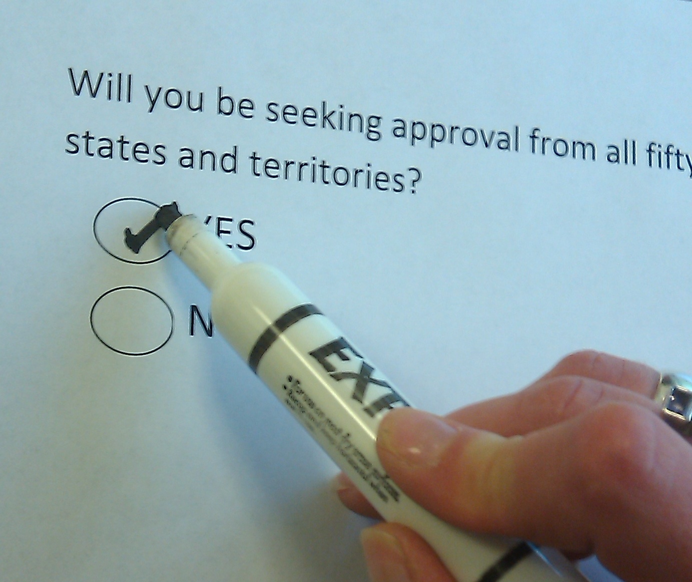 State Auth Survey Photo of hand checking survey answer