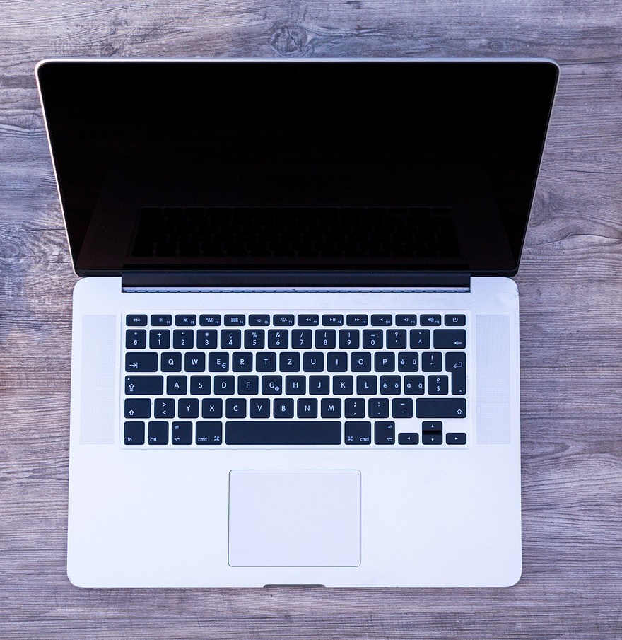 A laptop sitting on a table 
