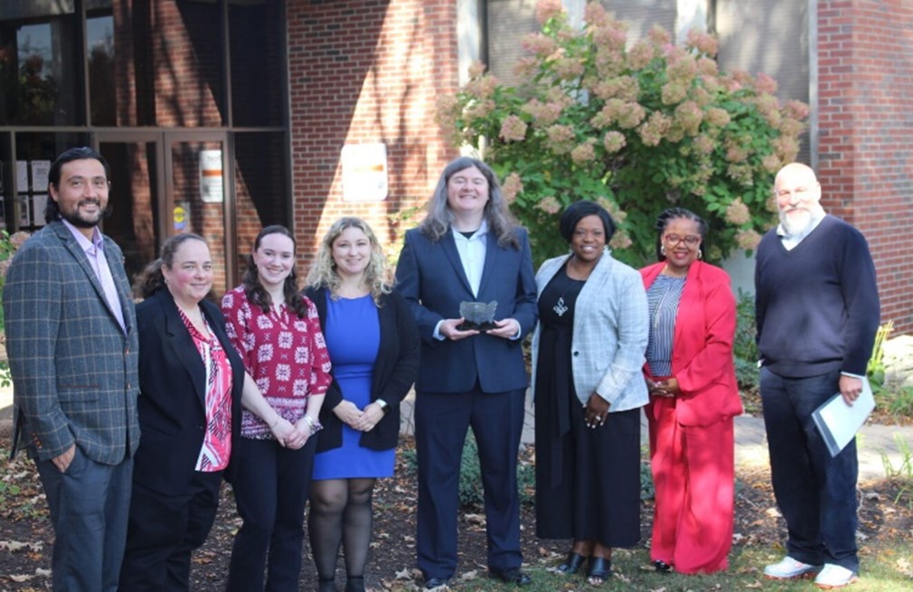 Photo - Members of the Post University team from left to right) Alex Larsson, Accreditation Specialist; Melissa Pilloise, Accreditation Specialist; Christine Adamczyk, Accreditation Specialist; Michelle Hubbell, Director of Military and Graduate Admissions; Shawn Fields, Associate Director of Accreditation; Jana Walser-Smith (State Authorization Network); Sandra Wilson, Co-Provost; Jeremi Bauer, Co-Provost.