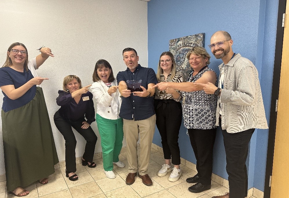 (Rio Salado College’s team from left to right) Janelle Elias, Kate Smith, [Cheryl Dowd, State Authorization Network], Ramsey Itani, Melissa Schrand, Karol Schmidt, and Zach Lewis.