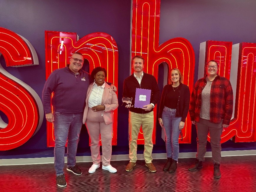 (The SNHU team pictured from left to right): Scott Barker, [Jana Walser-Smith, State Authorization Network], Evan Lowry, Ellery Ewing, and Michelle Berthiaume. 