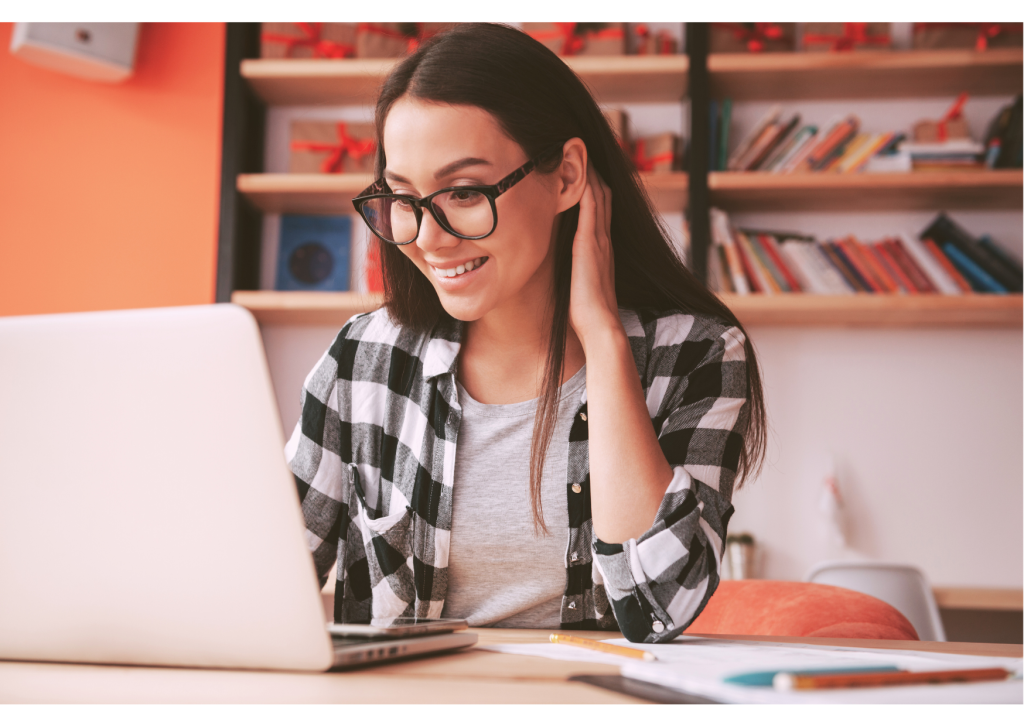 A young woman using a laptop computer