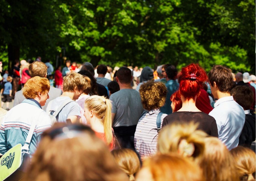 crowd of students facing away from the camera